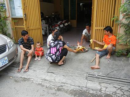 A family burning offerings