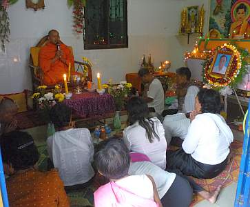 Head monk preaching