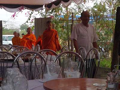 Monks arriving at the home