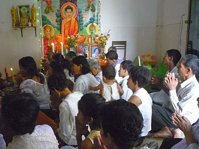 Family listening to chanting
