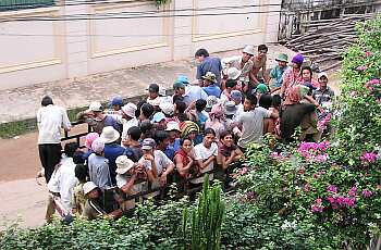 50 workers in the back of a truck