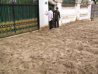 Sand dumped to block the mud