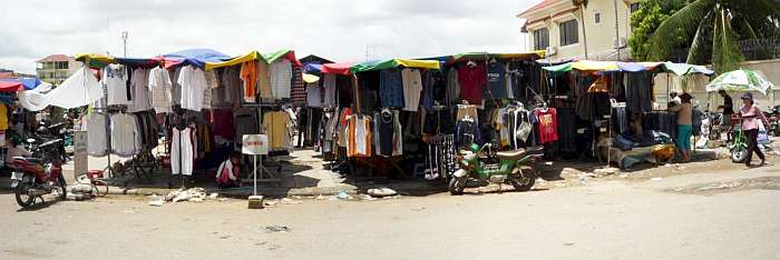Racks of clothing in a market