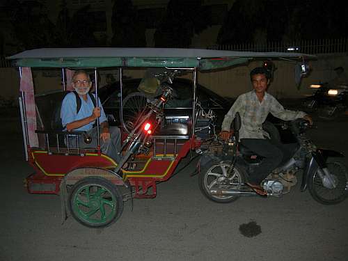 Charlie and bike in a tuk-tuk