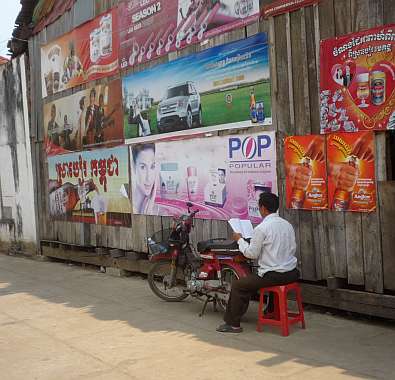 Man reading outside