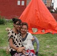 Description: C:\Users\hbrown\Pictures\Nepal\two friends living in a tent with 24 others...jpg